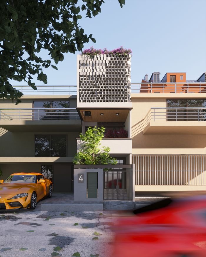 A contemporary residential building with a distinct modern architectural style featuring geometric patterns and vibrant cars.